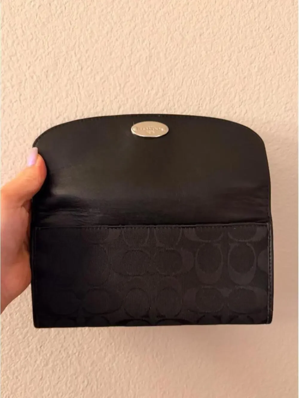 Black Coach Wallet with Silver Emblem